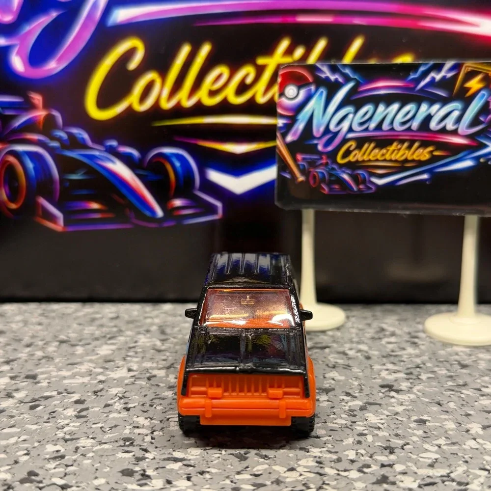 Matchbox Jeep Cherokee MB163 Black Orange Comic Graphics Diecast SUV 1:64 Scale